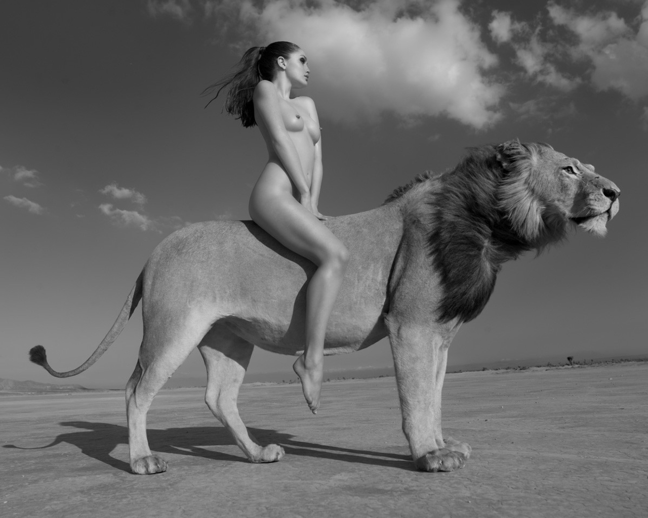 nude girl riding a lion wallpaper